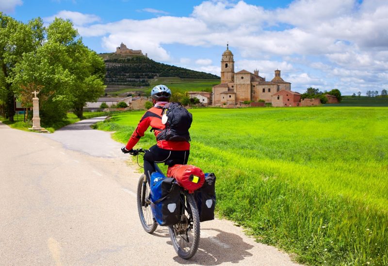 cyclist near Castrojeriz Meseta Camino Frances route Camino de Santiago tours JWT travel